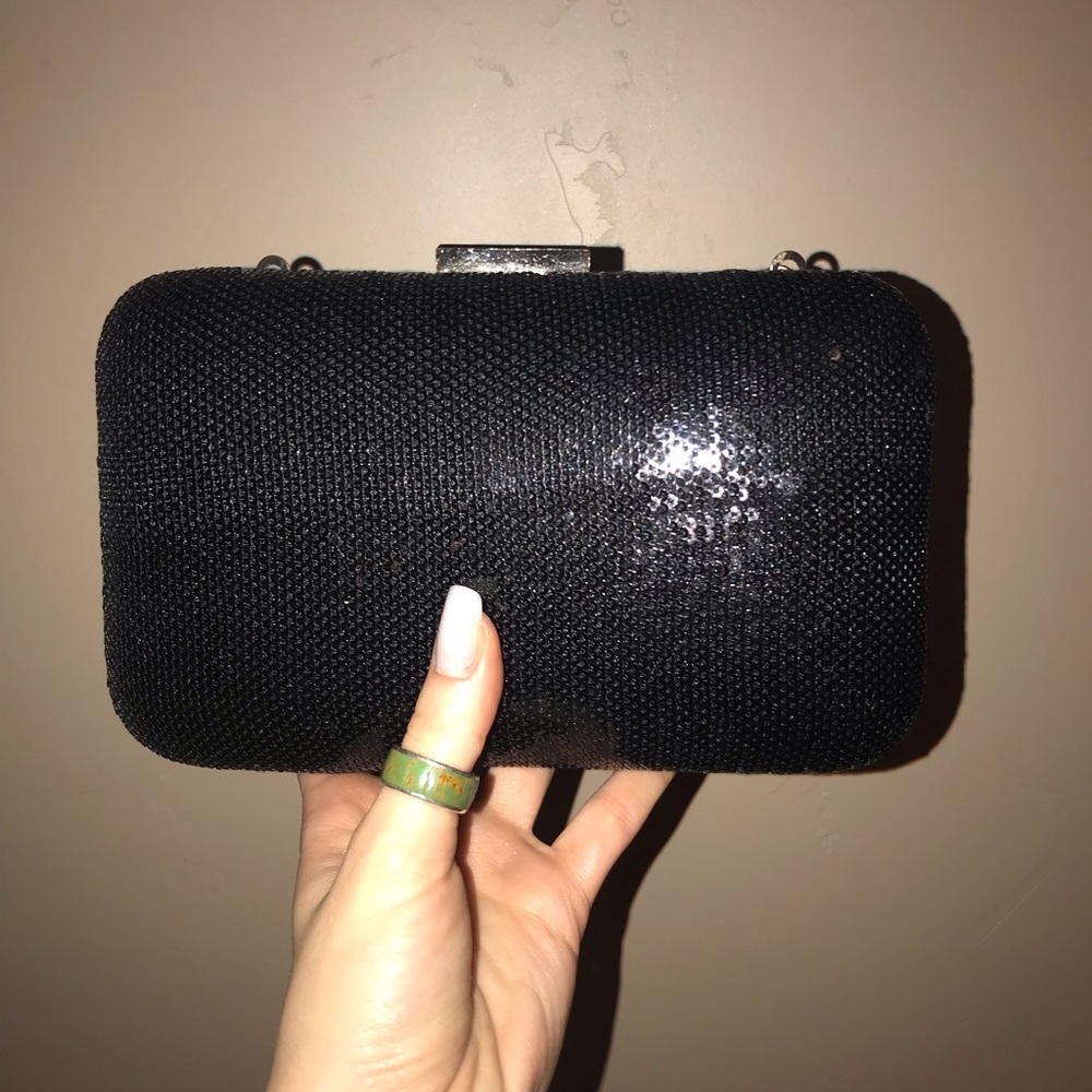 Small sequence handbag with gold accents